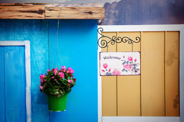 Flower pot and welcome sign