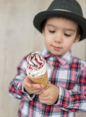 Happy little kid with ice cream