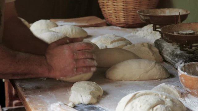 bread preparing for baking in traditional bake house