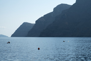 Nea Kameni volcanic island in the caldera at Santorini, Greece