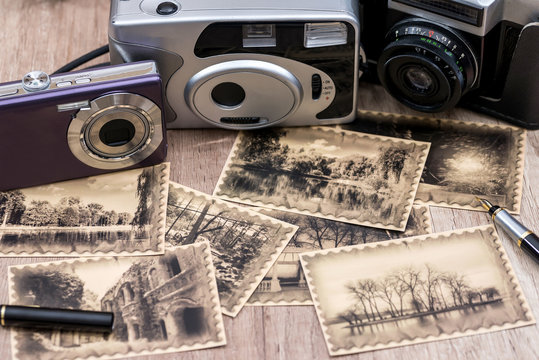 Old camera and photos with retro image. close up