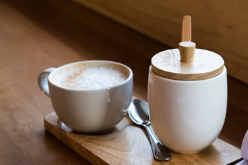 warm vintage concept : empty hot cappuccino coffee cup in cafe s