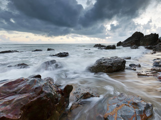 Slow shutter was used to capture flow of water at the beach.