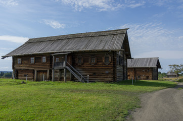 Fototapeta premium Traditional wooden house in village on island of Kizhi, Karelia, Russia