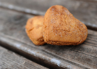 Homemade cookies with cinnamon  over wooden background