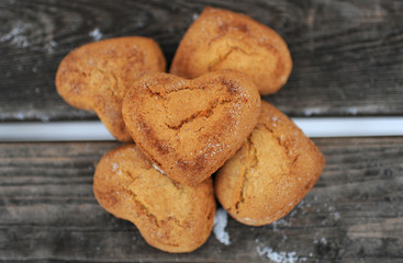 Homemade cookies with cinnamon  over wooden background