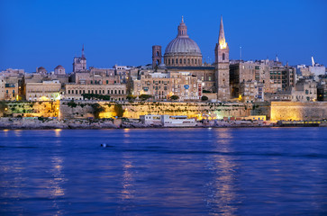 Fototapeta na wymiar The night view of Valletta skyline from Sliema. Malta