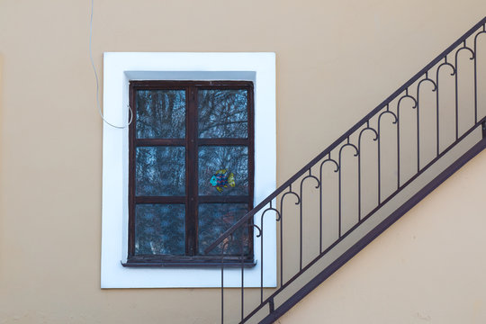 Window with a reflection and a fish picture