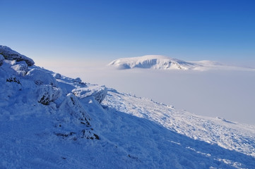 Fototapeta na wymiar Schneekoppe Aussicht im Winter - view from mountain Sniezka in winter