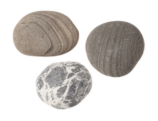 striped grey stones on white background