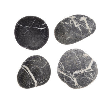Fototapeta striped black stones on white background