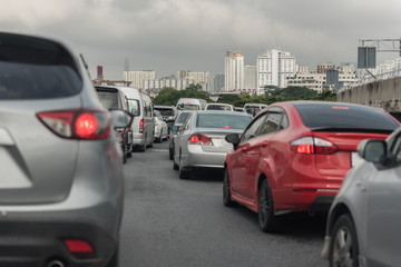 Fototapeta na wymiar Traffic jam with row of cars on exprees way