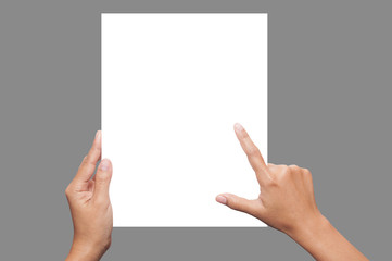 Woman hands holding paper isolated  on gray