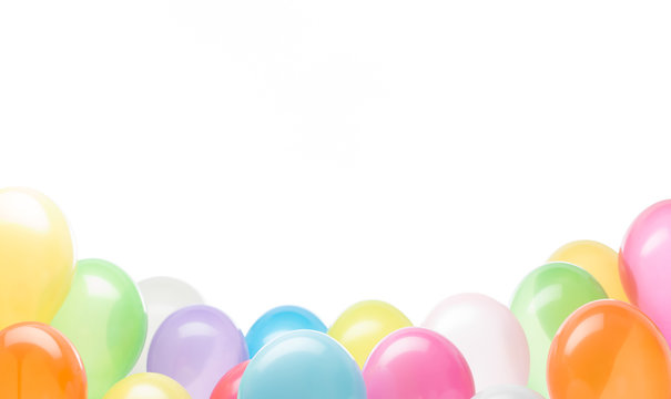 group of colorful balloons on the lower part of the image