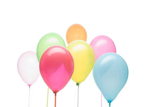 landscape image, group of colorful balloons on a sticks different colors on a white background