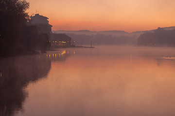 Naklejka na ściany i meble Misty sunrise morning on Ticino river (Sesto Calende, Italy)