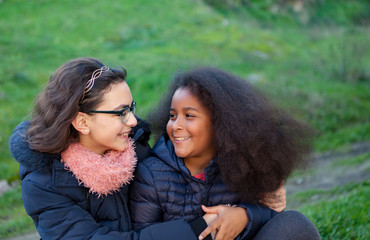 Two happy girls in the park