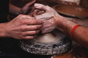 Fototapeta premium hands working with clay