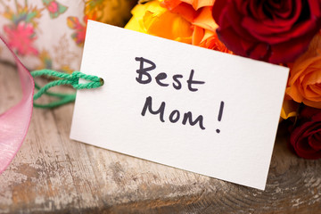 Closeup of Gift Card that Reads "Best Mom" Mothers' Day