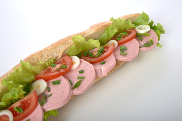 sandwich with sausage and vegetables isolated