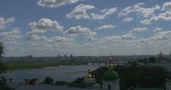 Kiev Pechersk Lavra With Its Numerous Churches and Golden Domes and the Picturesque Dniper River Floating Nearby and Impressive Cloudscape