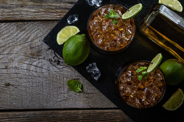Rum and cola cocktail in glasses