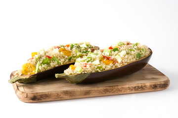 Stuffed eggplant with quinoa and vegetables, isolated on white background
