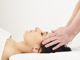 Fototapeta na wymiar Professional masseur and a woman customer