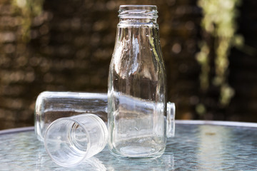 Glass and bottle on the table