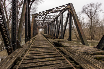 Fototapeta na wymiar Abandoned, Derelict Railroad Bridge over Shenango River in Pennsylvania