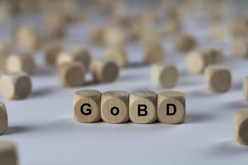 GoBD - Würfel mit Buchstaben auf dem das Wort abgebildet ist. Andere Würfel liegen verstreut um...
