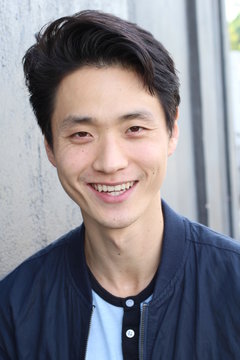 Asian man with a perfect white smile