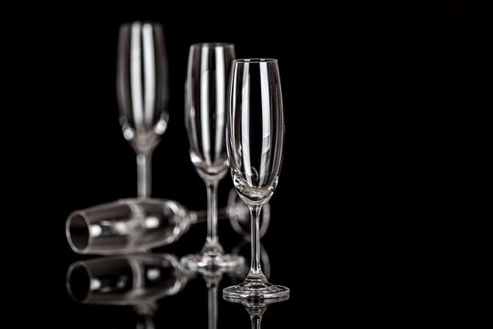 Champagne glasses isolated on black