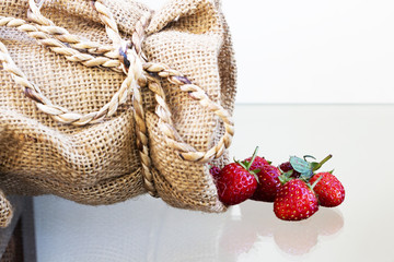 Strawberry berries on the ground.