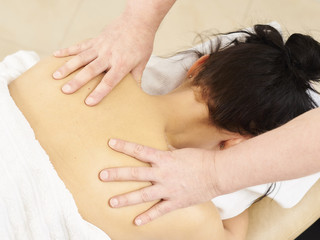 Obraz na płótnie Canvas Professional masseur and a woman customer