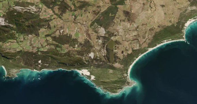 High-altitude overflight aerial of Cape Agulhas and adjacent land, South Africa. Clip loops and is reversible. Elements of this image furnished by USGS/NASA Landsat