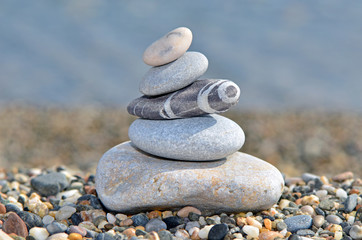 Fototapeta na wymiar Stack of pebbles on beach