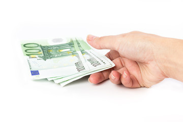 Female hand holding 100 euro banknotes