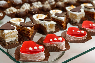 sweet buffet - chocolate cakes, souffle and Swiss rolls, caterin