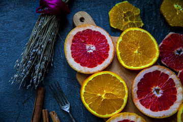 bright slices oranges on the table