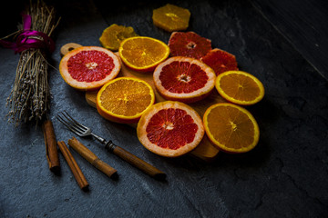 bright slices oranges on the table