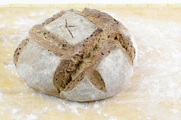 Home Baked Bread Closeup On Wooden Background