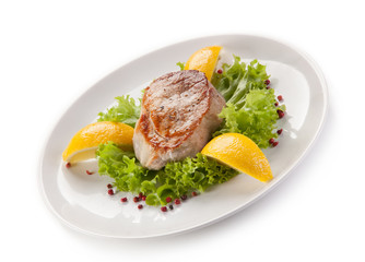 Fish dish - fried tuna steak and vegetables 