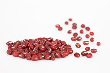 Pile of red azuki  beans on white background. Vegan vegetarian healthy food.