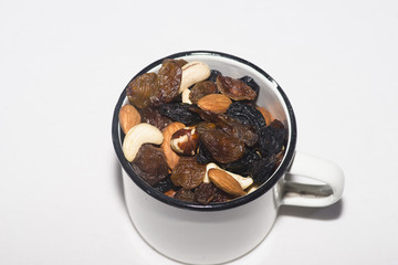 mixed nuts in the metal cup