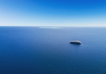 Aerial view of big yacht in sea