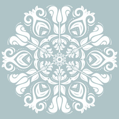Oriental round pattern with arabesques and floral elements. Traditional classic ornament. Light blue and white pattern