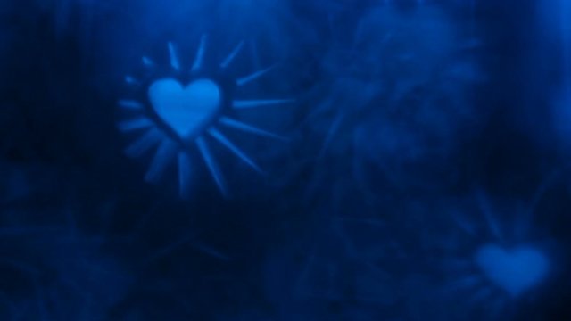 Blue Hearts Background for Valentine's Day or Wedding's Day. Glittering bokeh lights.