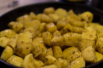 Cooking fried potatoes with spicies