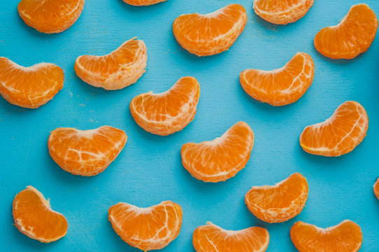 tangerine slices on a blue background